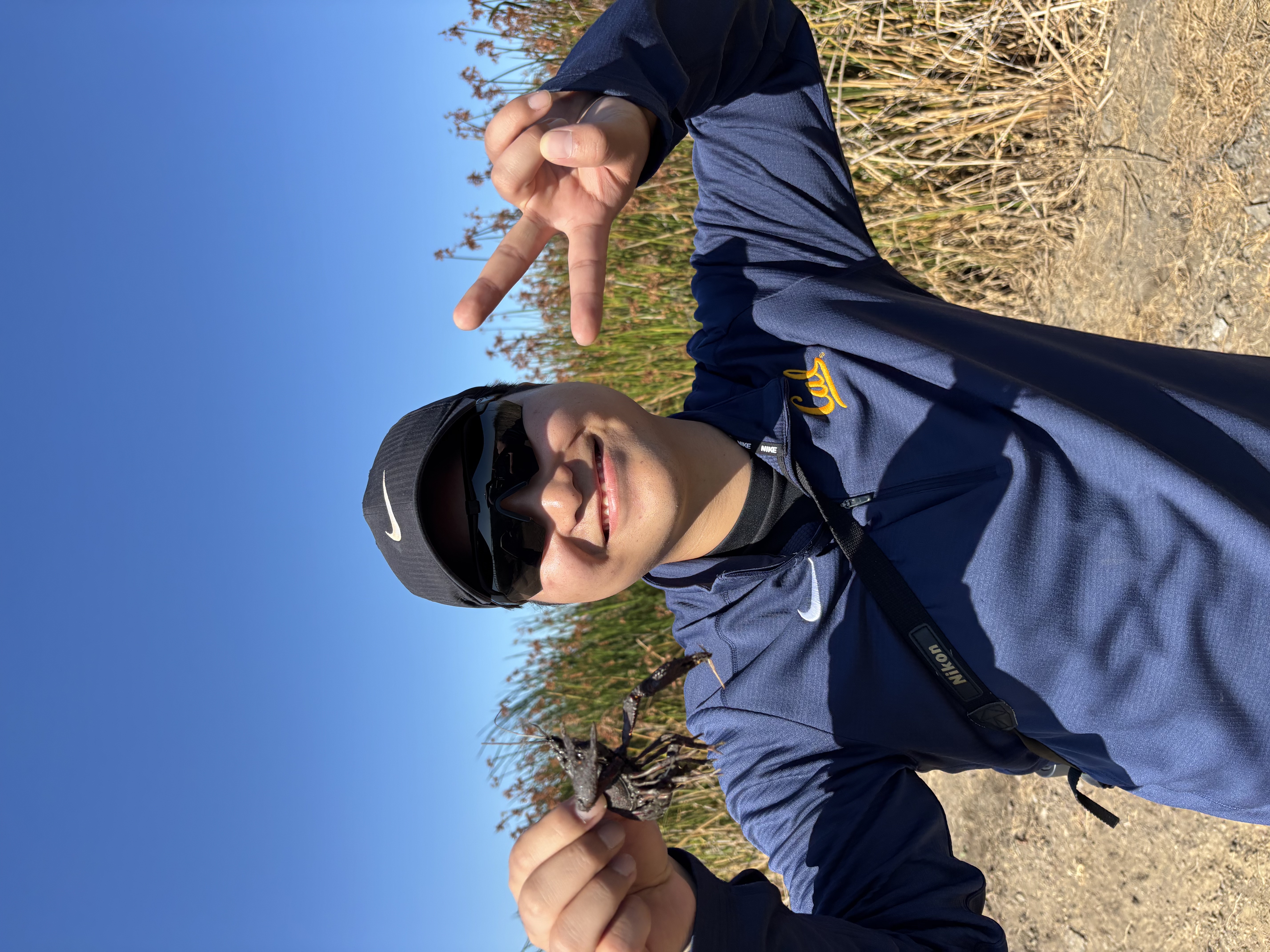Joohwan catching crawfish in Whale’s Mouth